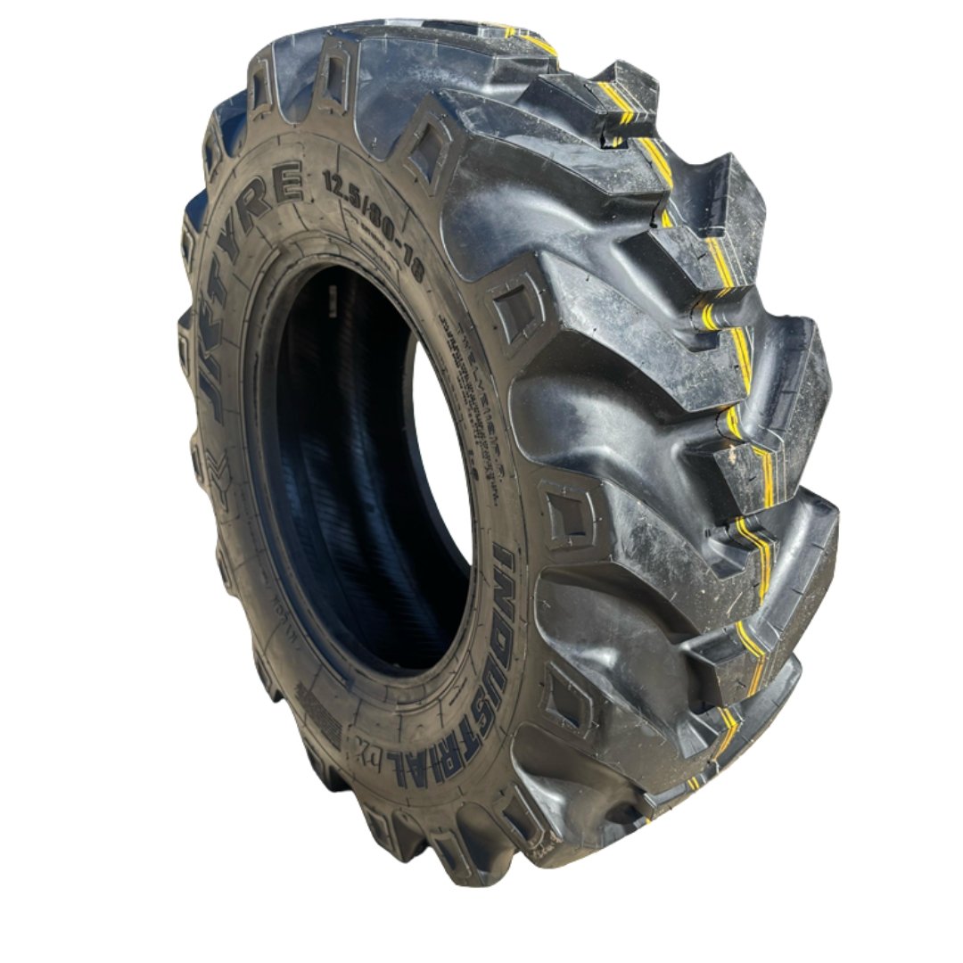 PNEU 12.5/80-18 OTR 12PR TL DX JK - Pneutek Pneus